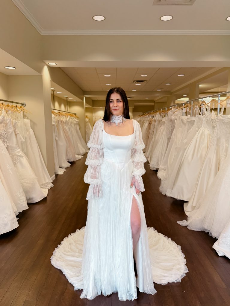 Boho bridal gown with textured tulle skirt and bubble sleeves