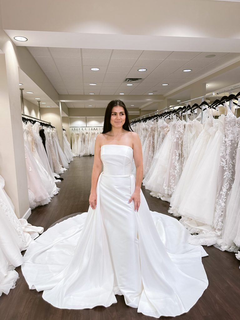 Mikado strapless fitted dress with straight neckline and overskirt
